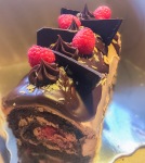 Chocolate Swiss Roll filled with chocolate buttercream and raspberries