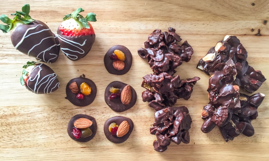 From left to right: Chocolate Covered Strawberries, Chocolate with Toasted Almond, Dried Apricot and Cranberry, Chocolate Covered Cornflakes and Dried Fruits, Almond Chocolate Bar.